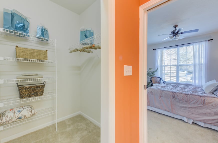 Storage space in a master bedroom closet.